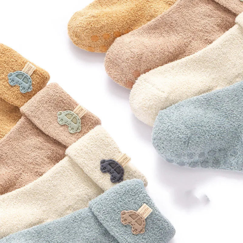 Set of 4 baby socks in mixed colours with velvet keep warm feature and non-slip sole
