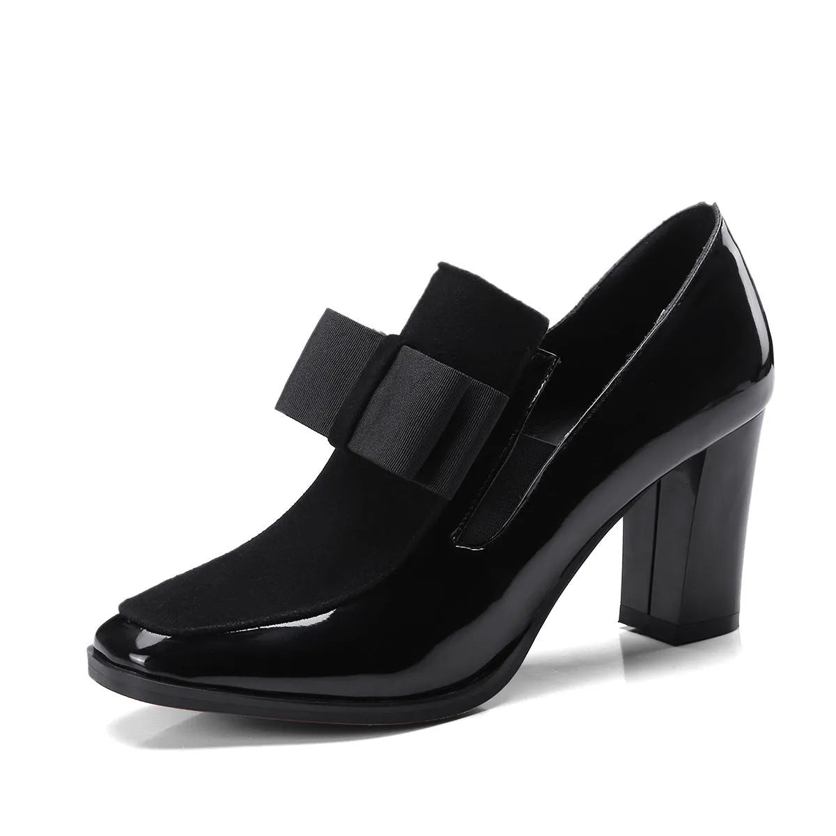 Black leather women's high heel shoes with a thick block heel and square toe, showing patent leather finish.