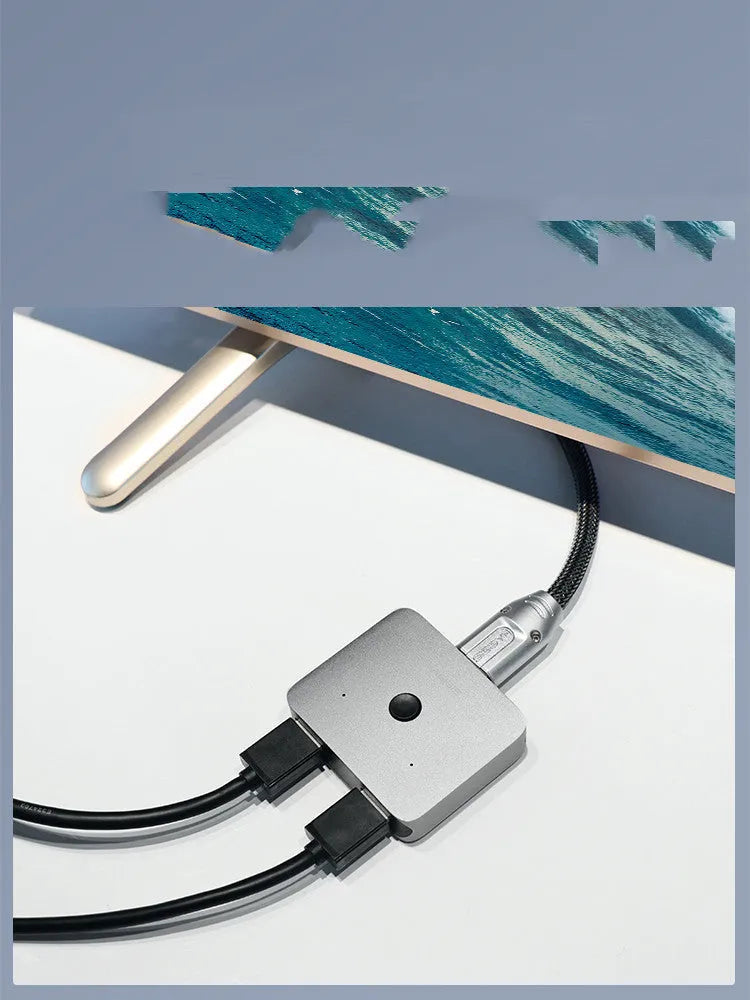 Gray Haibeisi HDMI splitter showing 1 input and 2 output ports for 4K signal distribution