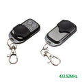Black metal universal garage door remote with four buttons and 100 metre range