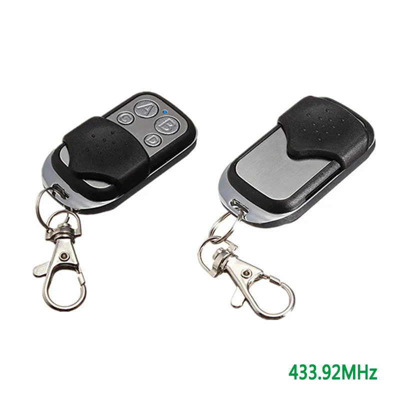 Black metal universal garage door remote with four buttons and 100 metre range