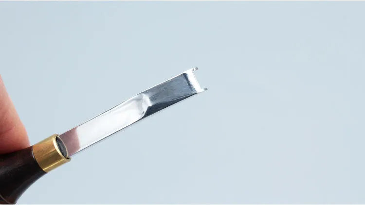 Leather thinning knife with wide shovel edge blade for sectional cutting and skiving