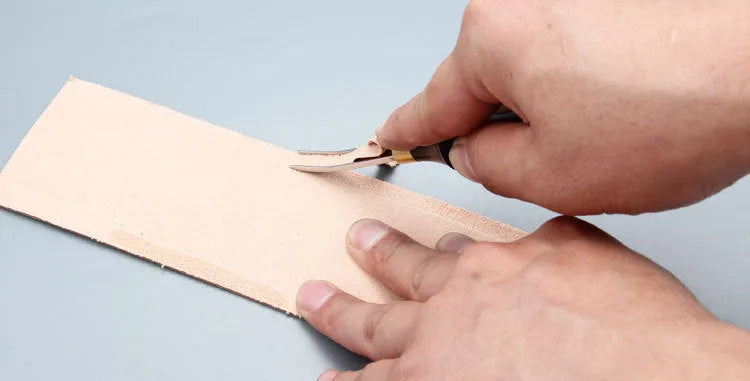 Leather thinning knife with wide shovel edge blade for sectional cutting and skiving