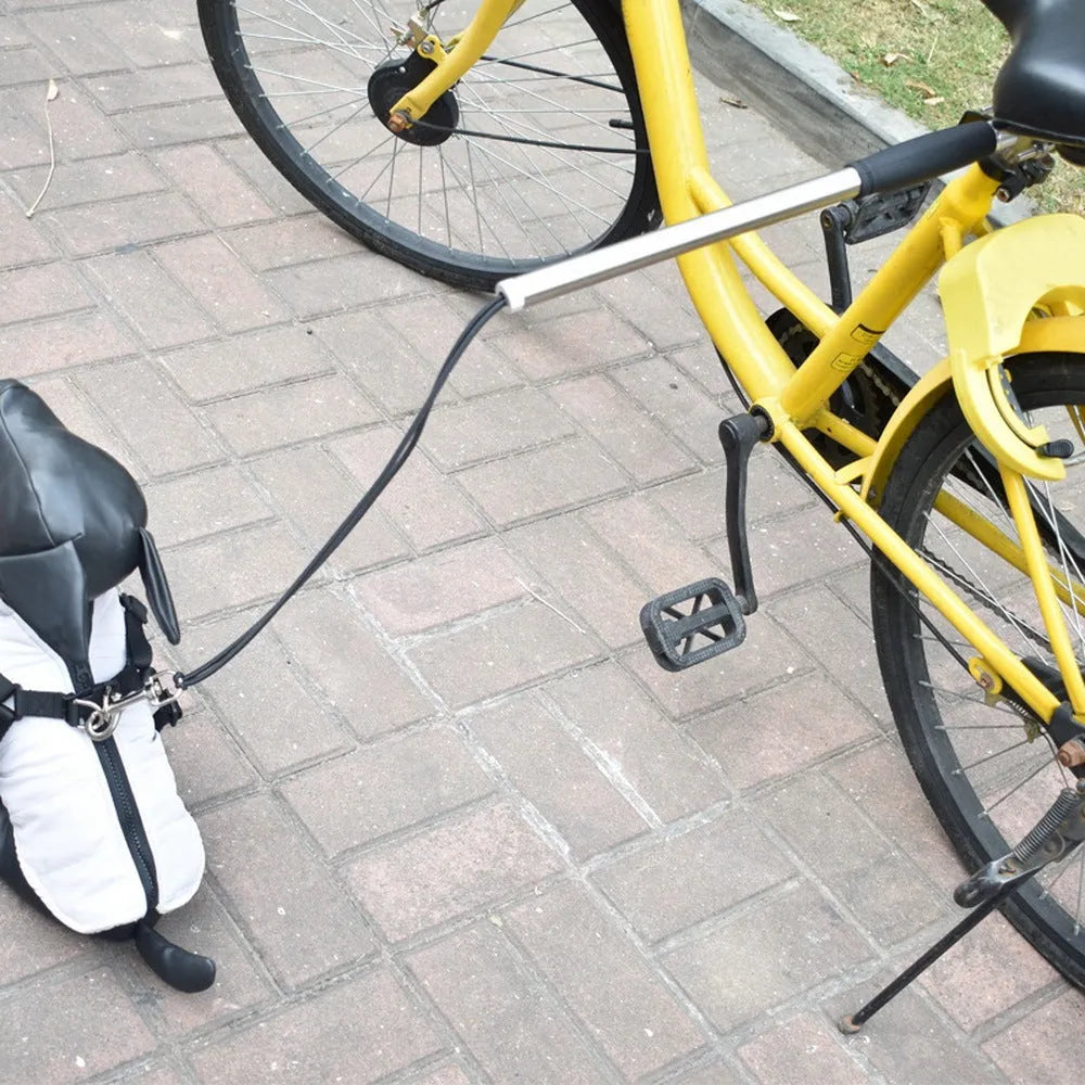 Black stainless steel dog bike leash with 44cm handle and 55cm rope attached to bicycle