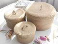 Japanese style linen fabric storage basket with a lid in small, medium, and large sizes.