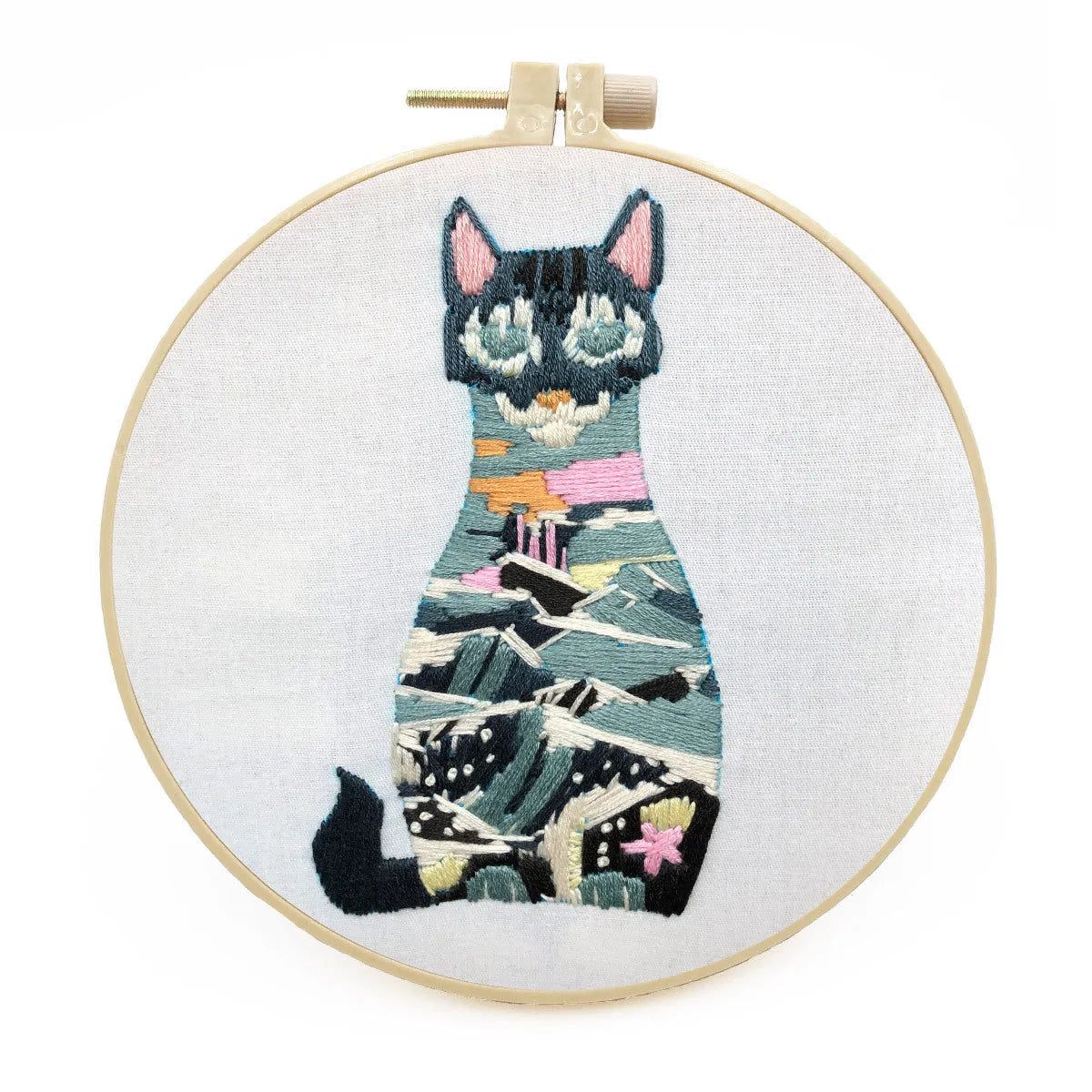 European embroidery starter kit showing pre-printed cat cross stitch design on fabric in a 15cm wooden hoop.