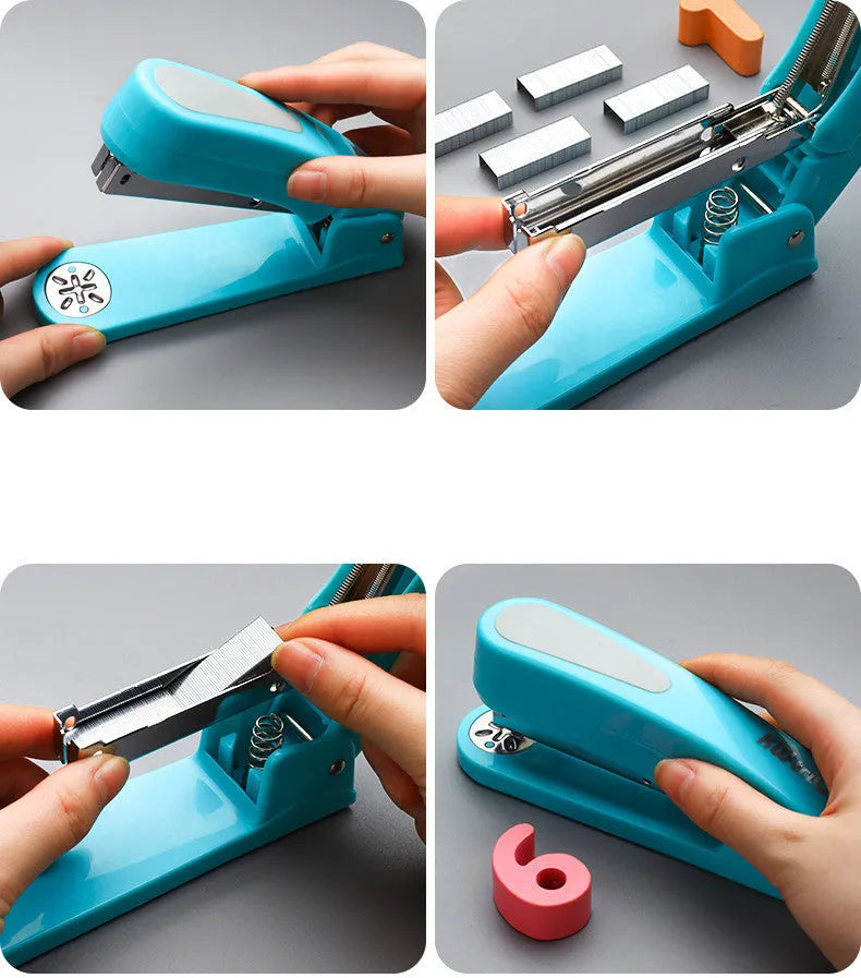 360-degree rotatable stapler in dark blue on a desk with A4 paper