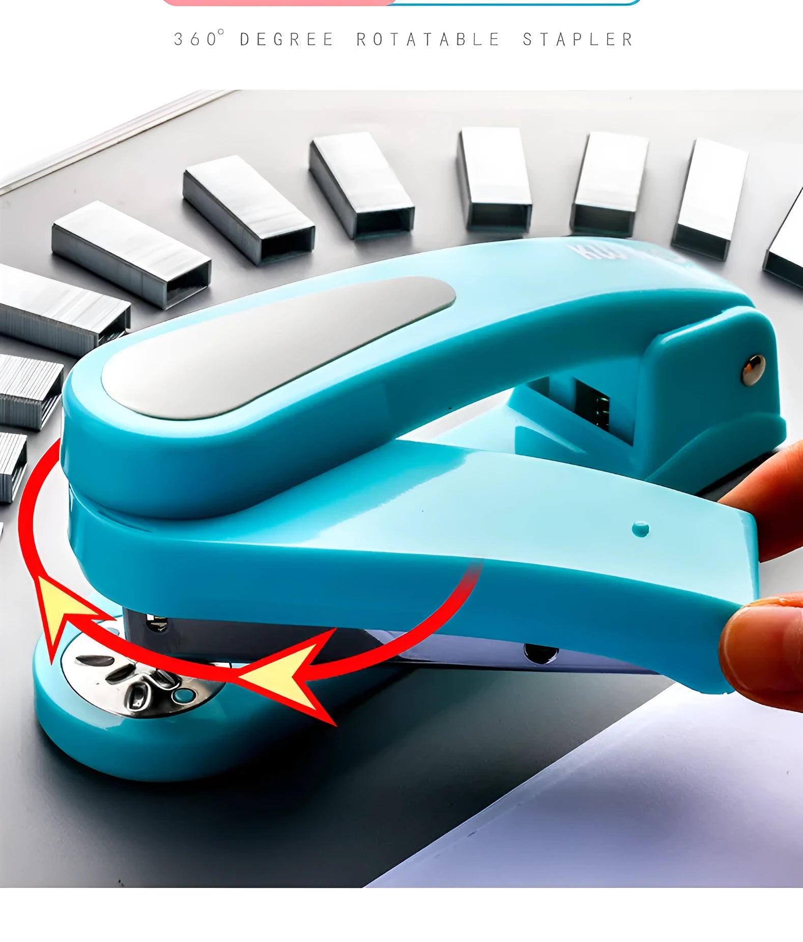 360-degree rotatable stapler in dark blue on a desk with A4 paper
