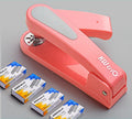 360-degree rotatable stapler in dark blue on a desk with A4 paper