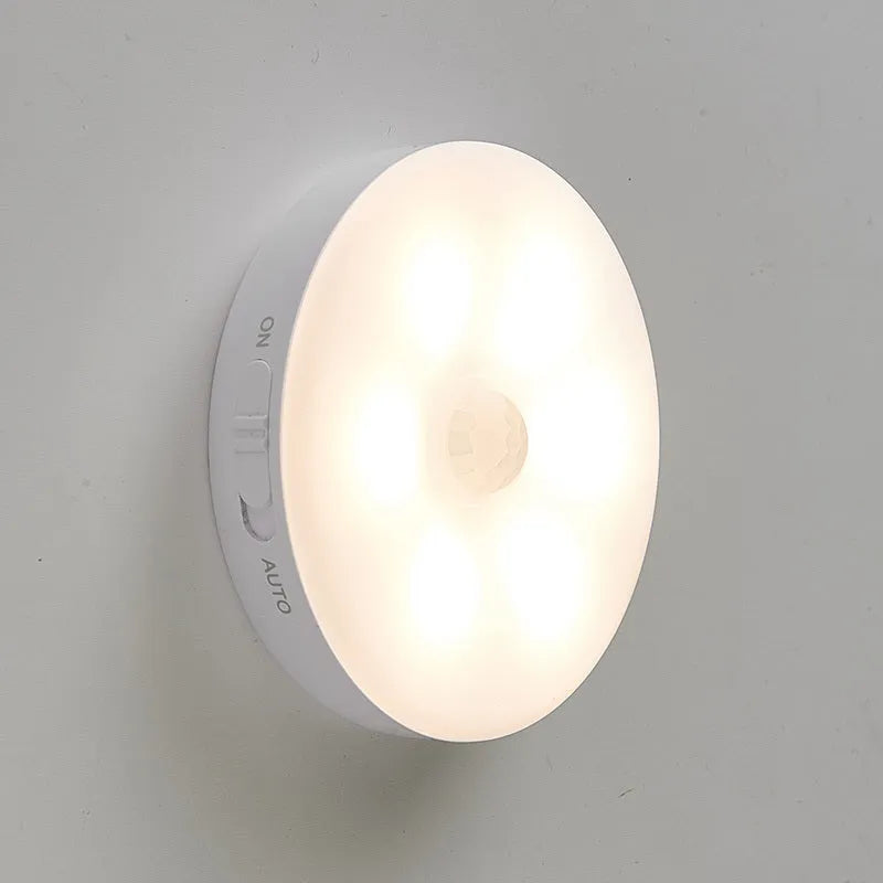 Wireless body sensing LED light for automatic night-time illumination in cabinets and hallways