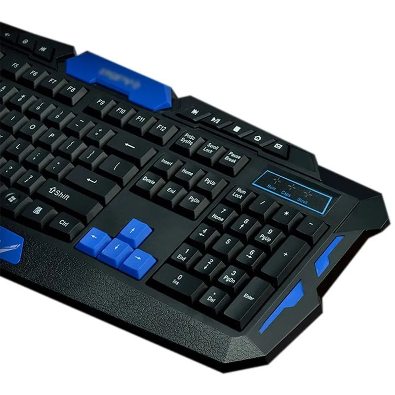 Black and blue wireless keyboard and mouse set on desk with gaming and work applications