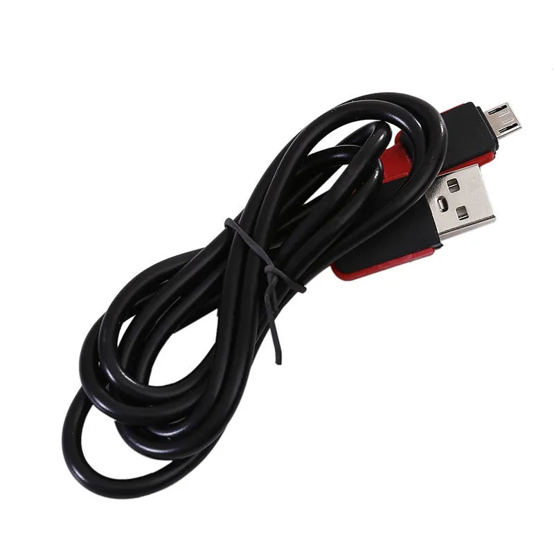 Red portable COB LED work light with a magnetic base and USB charging port.