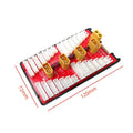 V2 parallel charging board for RC batteries with four ports, gold connectors, and fuse protection.