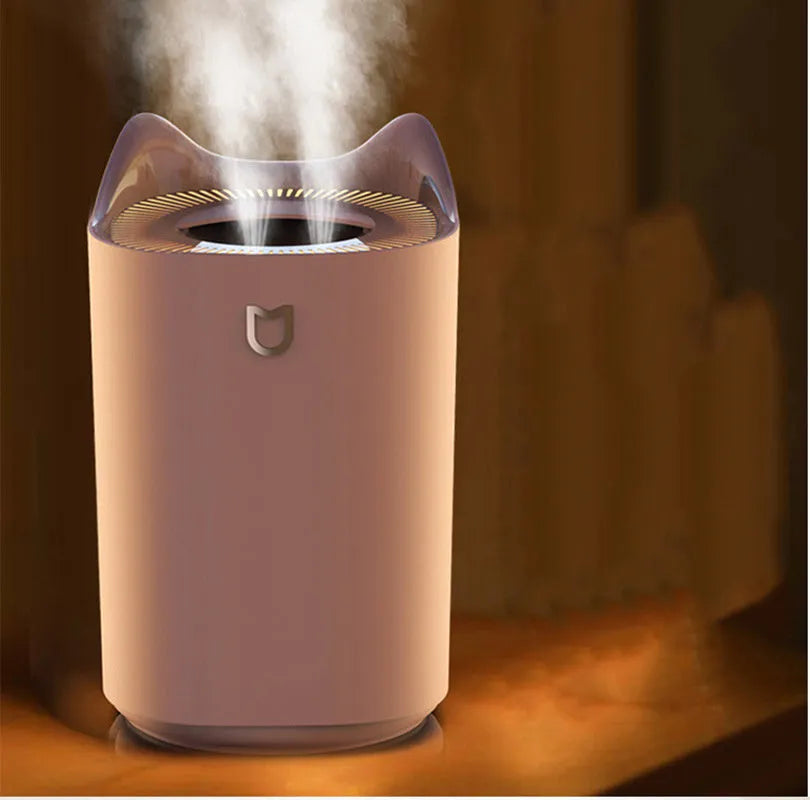 Double spray humidifier with three mist outlets and USB cable in Coral Pink or Glacier White colour