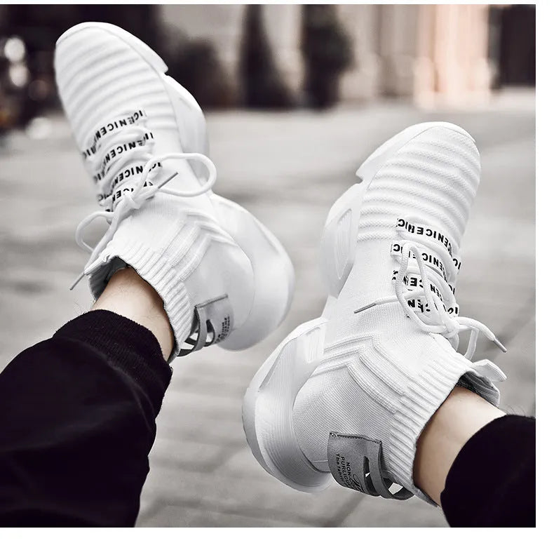 Men's black and white casual sports shoes with mesh lining available in sizes EU 39 to EU 47
