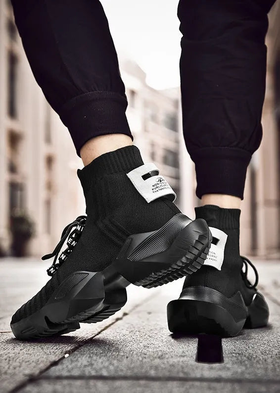 Men's black and white casual sports shoes with mesh lining available in sizes EU 39 to EU 47
