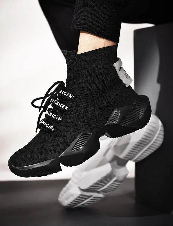 Men's black and white casual sports shoes with mesh lining available in sizes EU 39 to EU 47