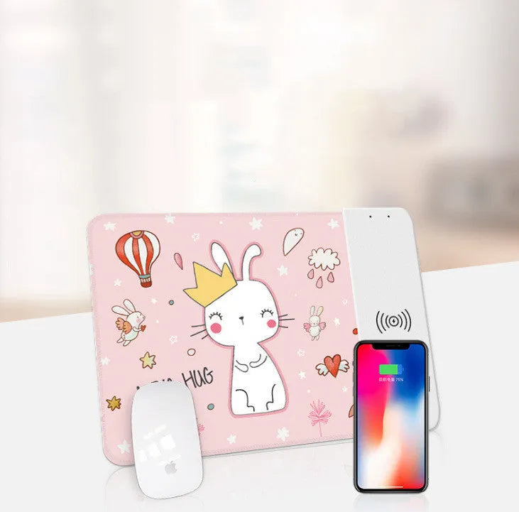 Cartoon wireless charging mouse pad with RGB lighting on black desk