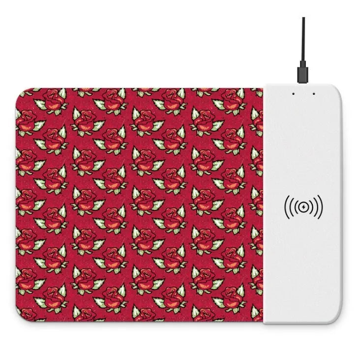 Cartoon wireless charging mouse pad with RGB lighting on black desk