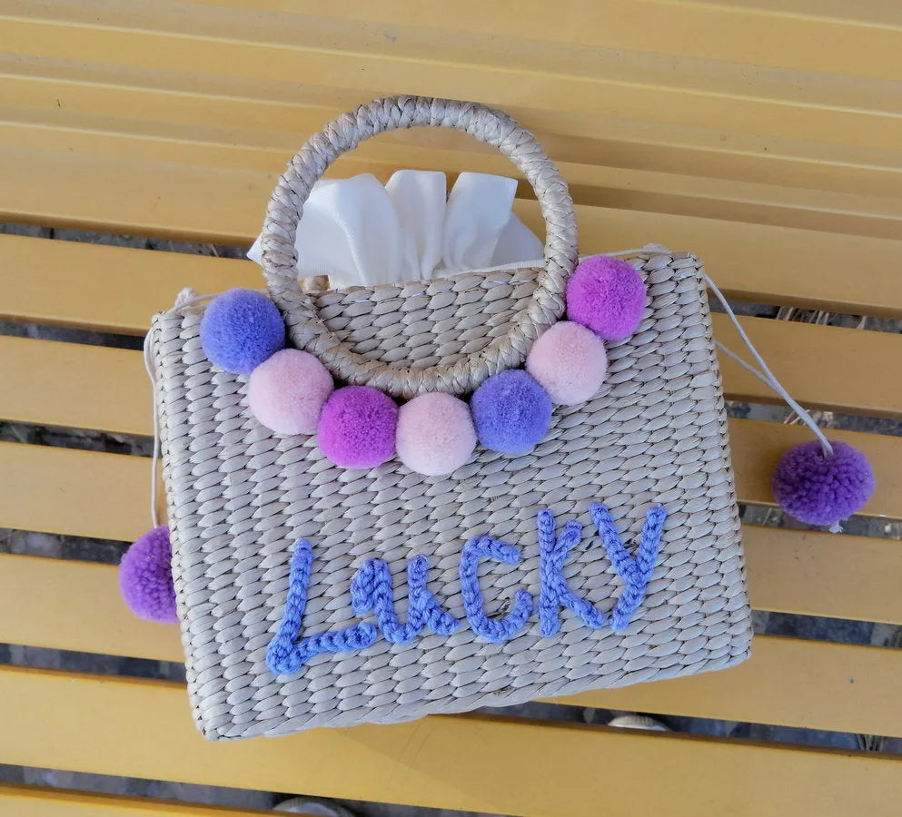 Thailand straw handbag with hydrangea letter embroidery, horizontal square shape, polyester lining and no straps, in photo colour.