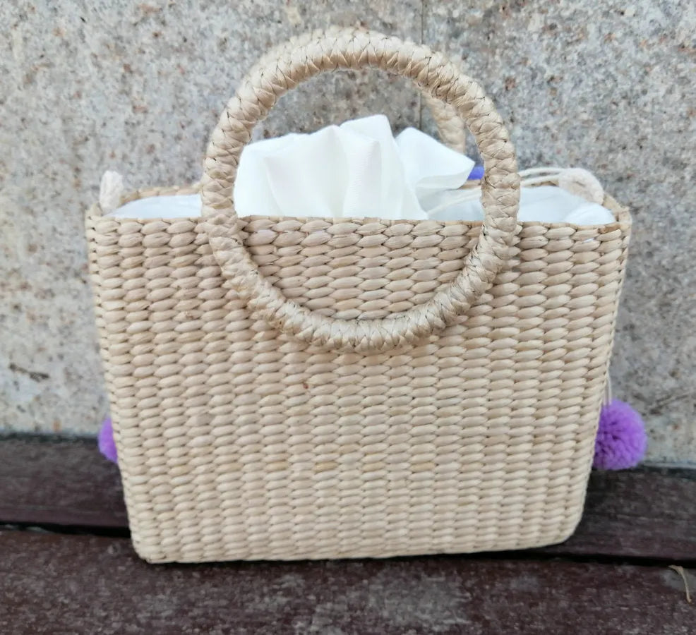 Thailand straw handbag with hydrangea letter embroidery, horizontal square shape, polyester lining and no straps, in photo colour.