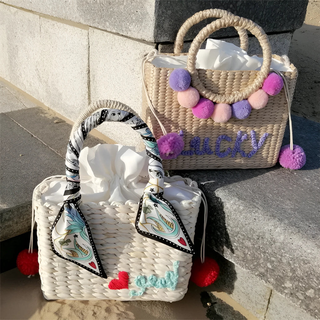 Thailand straw handbag with hydrangea letter embroidery, horizontal square shape, polyester lining and no straps, in photo colour.