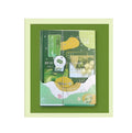 Hardcover notebook with artistic design, shown lying flat to display binding.