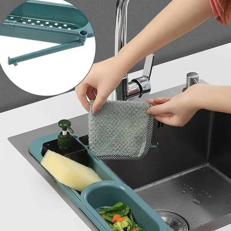 Adjustable telescopic sink rack organiser with drainage holes and sponge holder in kitchen