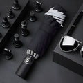 Automatic reverse umbrella with black canopy showing reverse folding design and plastic non-slip handle