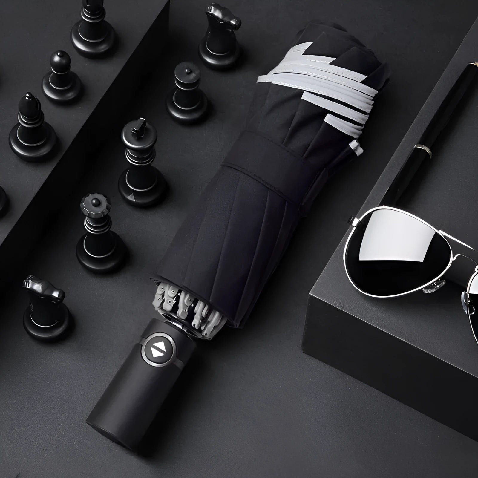 Automatic reverse umbrella with black canopy showing reverse folding design and plastic non-slip handle