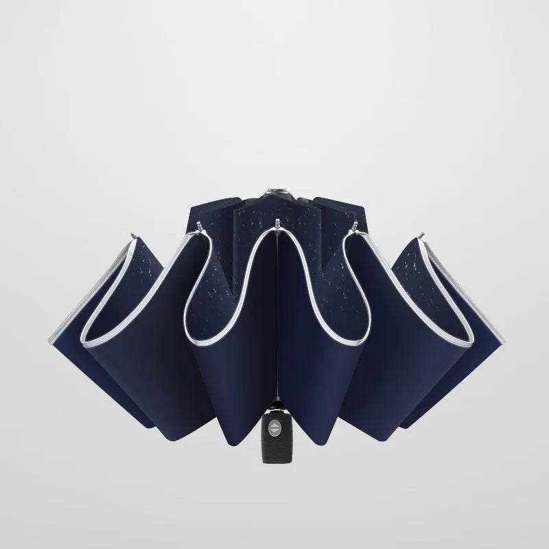 Automatic reverse umbrella with black canopy showing reverse folding design and plastic non-slip handle