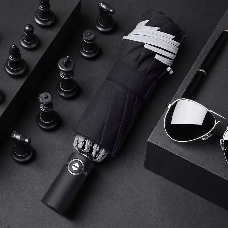 Automatic reverse umbrella with black canopy showing reverse folding design and plastic non-slip handle