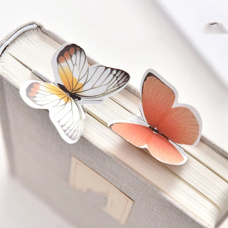 Butterfly paper bookmark measuring 13.5cm by 5.5cm with colourful design for page marking