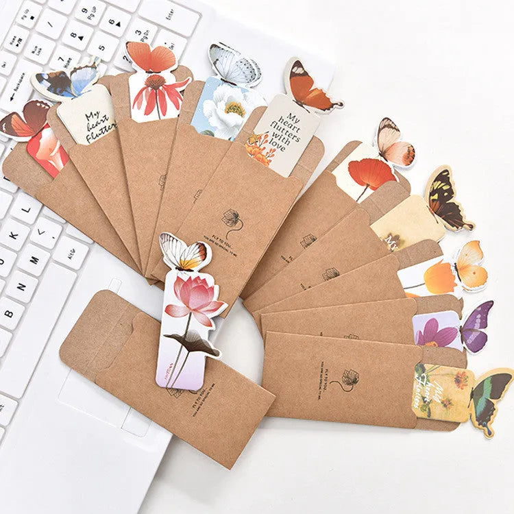 Butterfly paper bookmark measuring 13.5cm by 5.5cm with colourful design for page marking