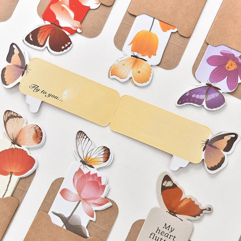 Butterfly paper bookmark measuring 13.5cm by 5.5cm with colourful design for page marking