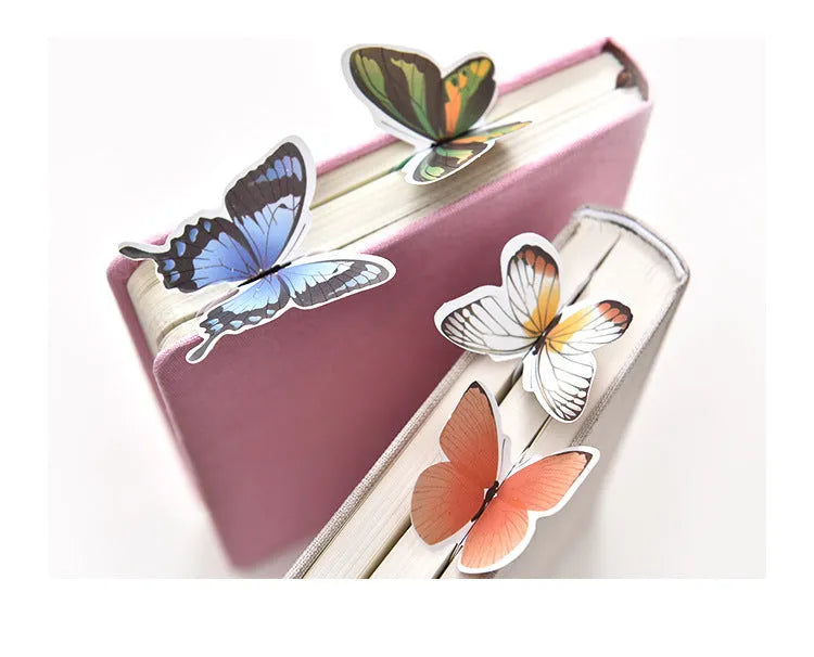 Butterfly paper bookmark measuring 13.5cm by 5.5cm with colourful design for page marking