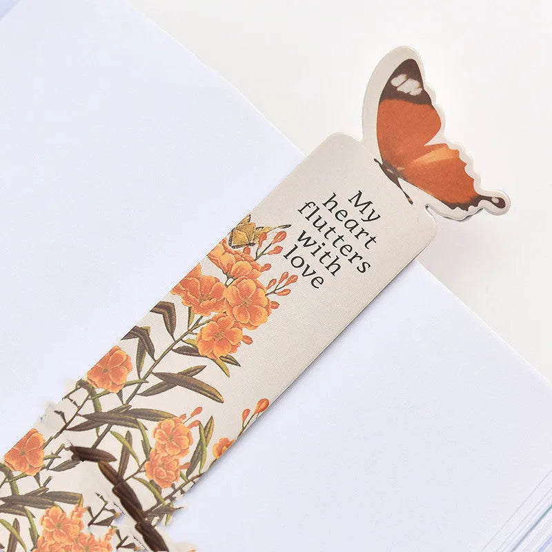 Butterfly paper bookmark measuring 13.5cm by 5.5cm with colourful design for page marking