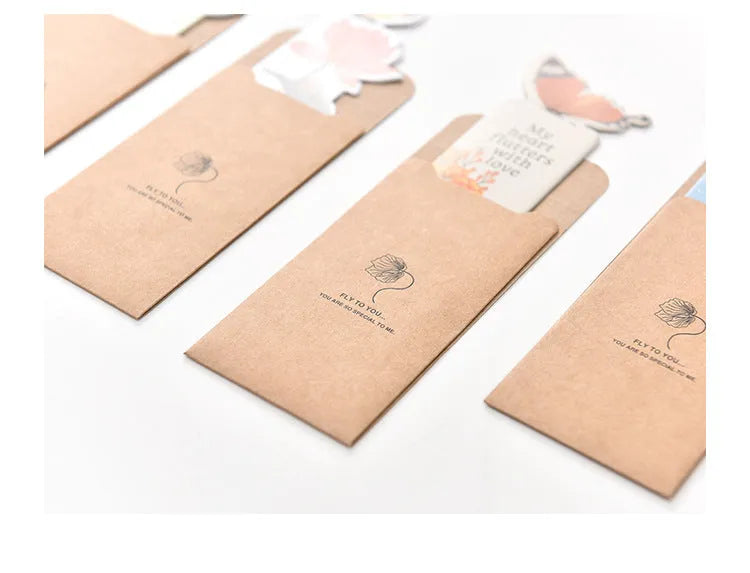 Butterfly paper bookmark measuring 13.5cm by 5.5cm with colourful design for page marking