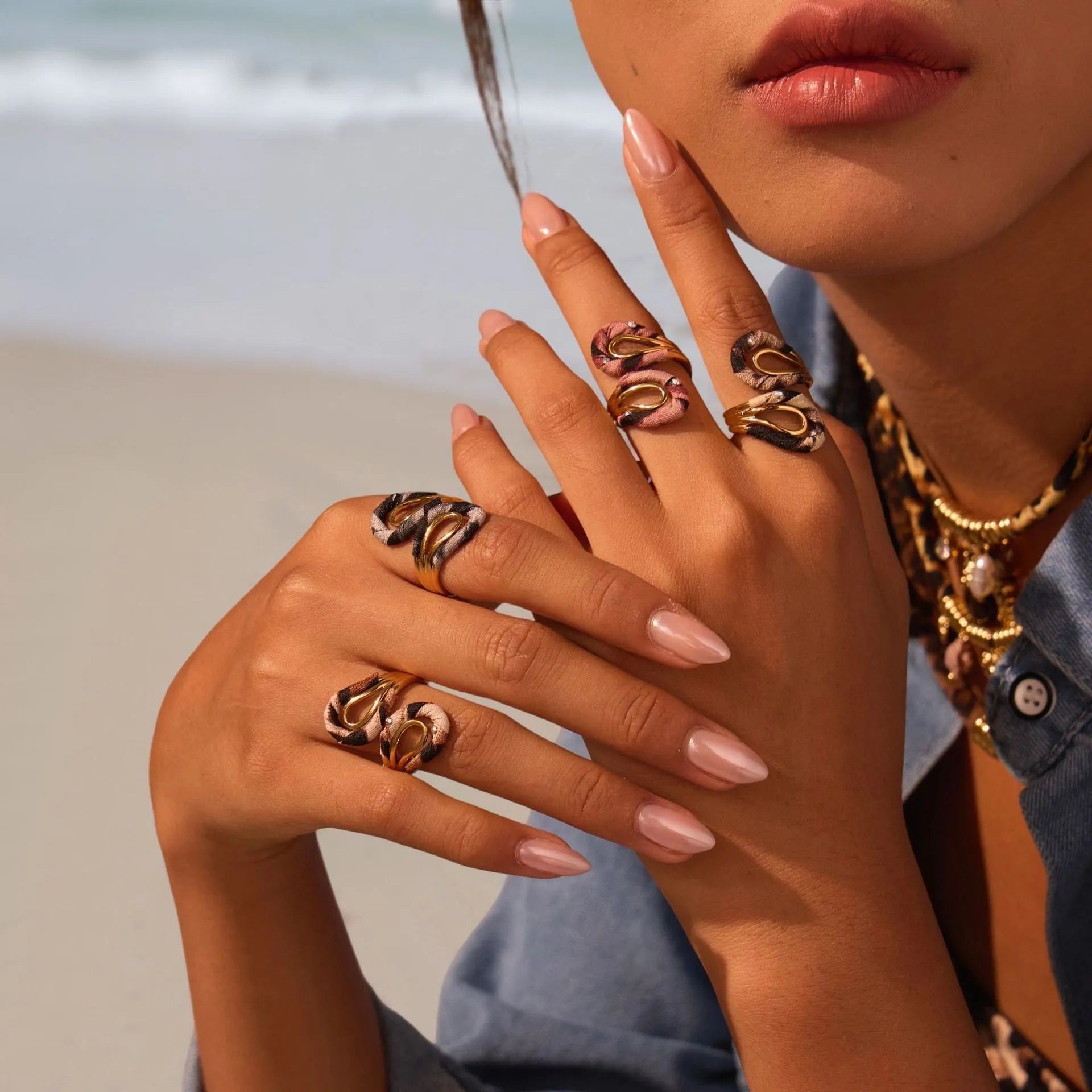 Stainless steel open mouth ring with leopard print geometric shapes in multiple colour options