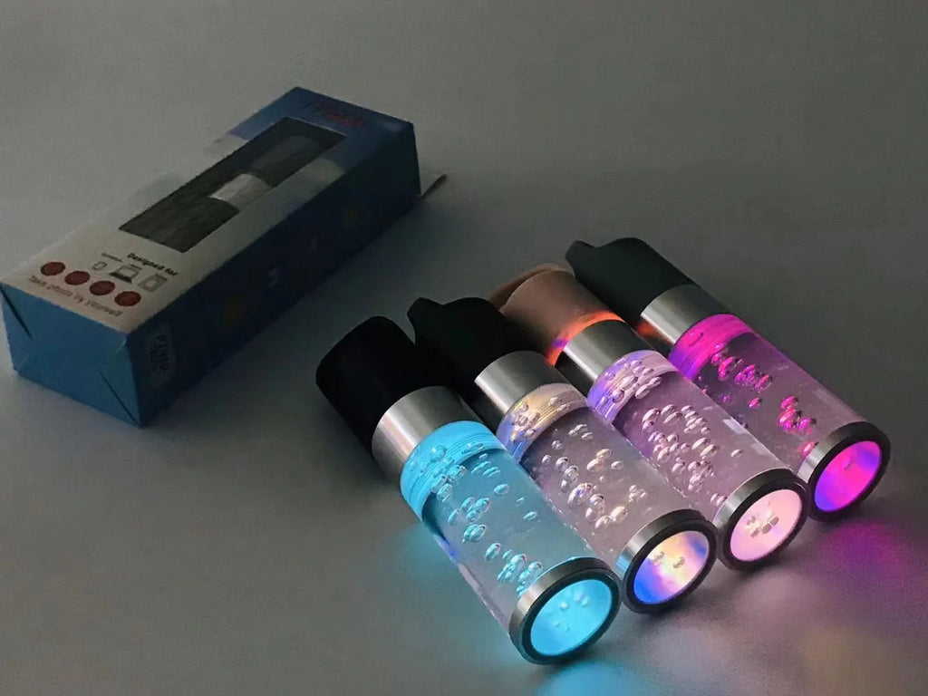 Portable Bluetooth speaker with crystal lighting in pink, black, silver grey, or green colour options