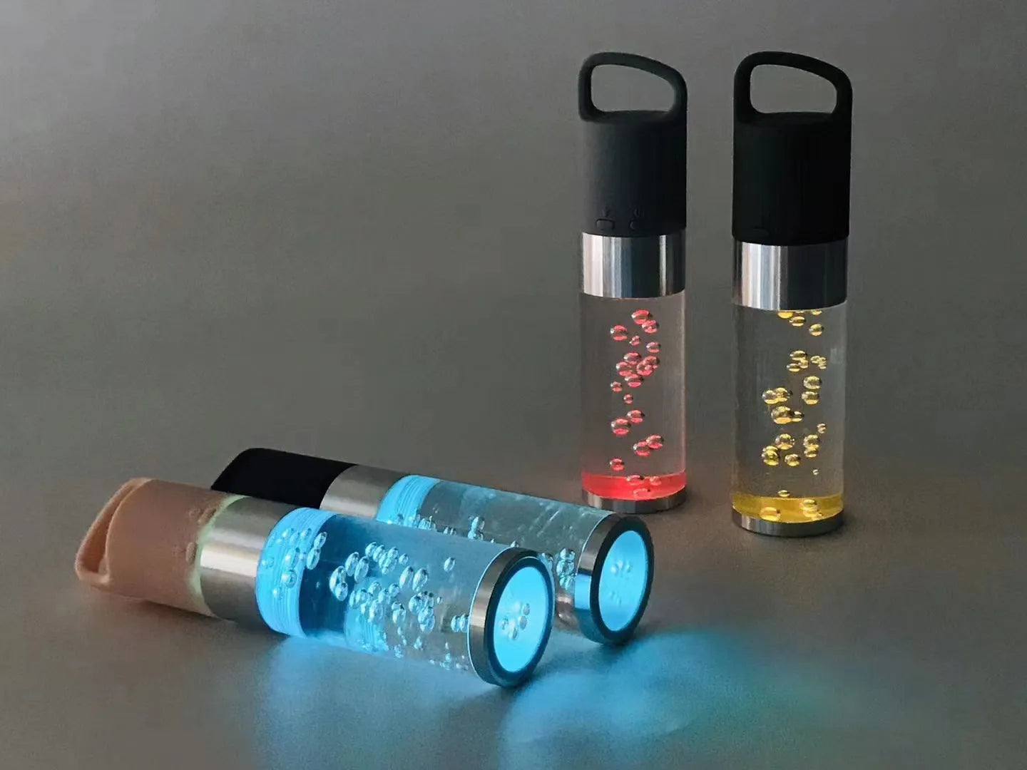 Portable Bluetooth speaker with crystal lighting in pink, black, silver grey, or green colour options