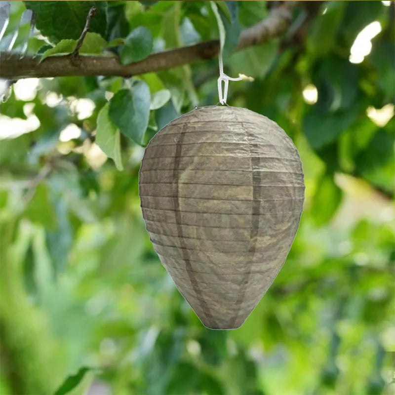 Hexagonal beehive lantern with paper and wire construction measuring 22cm by 28cm