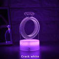 3D diamond ring LED night light with colour-changing acrylic panel on ABS plastic base.