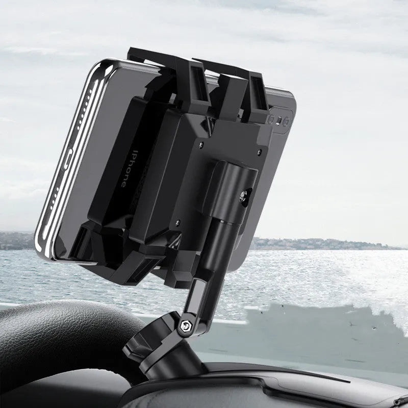 Black car phone holder with triple swivel rotation and dual spring clamp for dashboard or air outlet mounting.