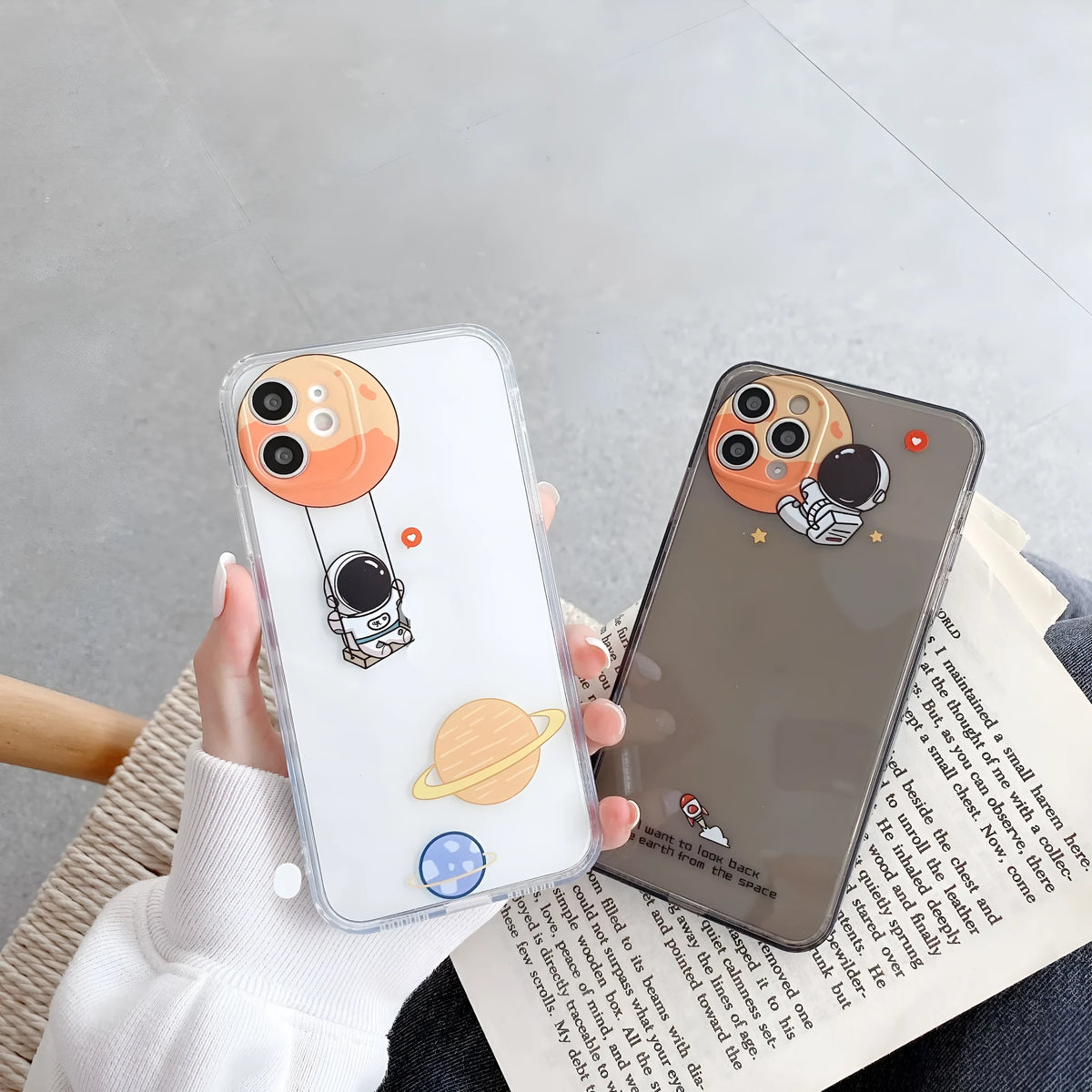 Cartoon astronaut TPU phone case in grey or white for iPhone models with graffiti pop art design