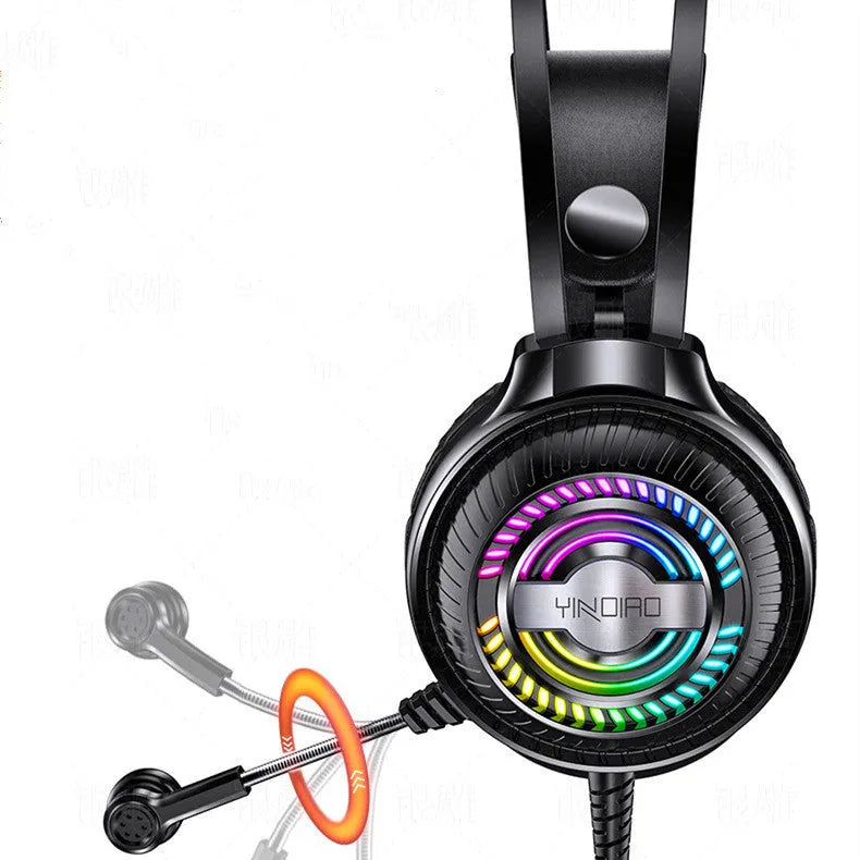Black wired PC gaming headset with microphone and large protein earmuffs, showing 3.5mm plug.