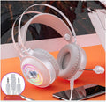 Black wired PC gaming headset with microphone and large protein earmuffs, showing 3.5mm plug.