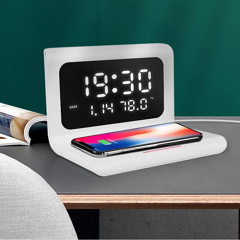 White wireless charger alarm clock showing calendar, temperature display and 10W charging surface