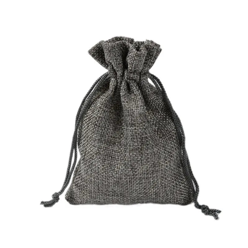 Mini linen drawstring jewellery pouch with rope closure, available in 7x9cm and 15x20cm sizes and nine colours