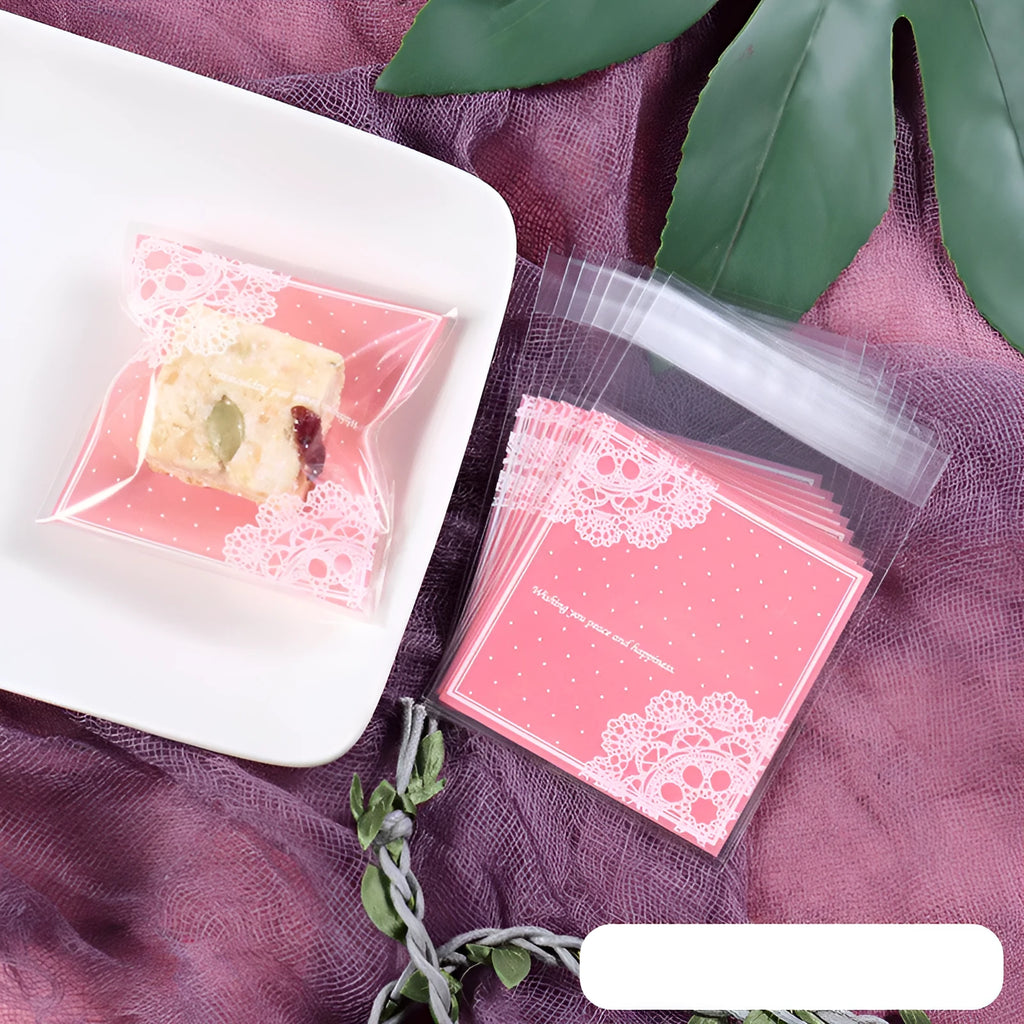 Pink self-adhesive plastic packaging bags for handmade soap, shown with dimensions 7cm by 7cm.